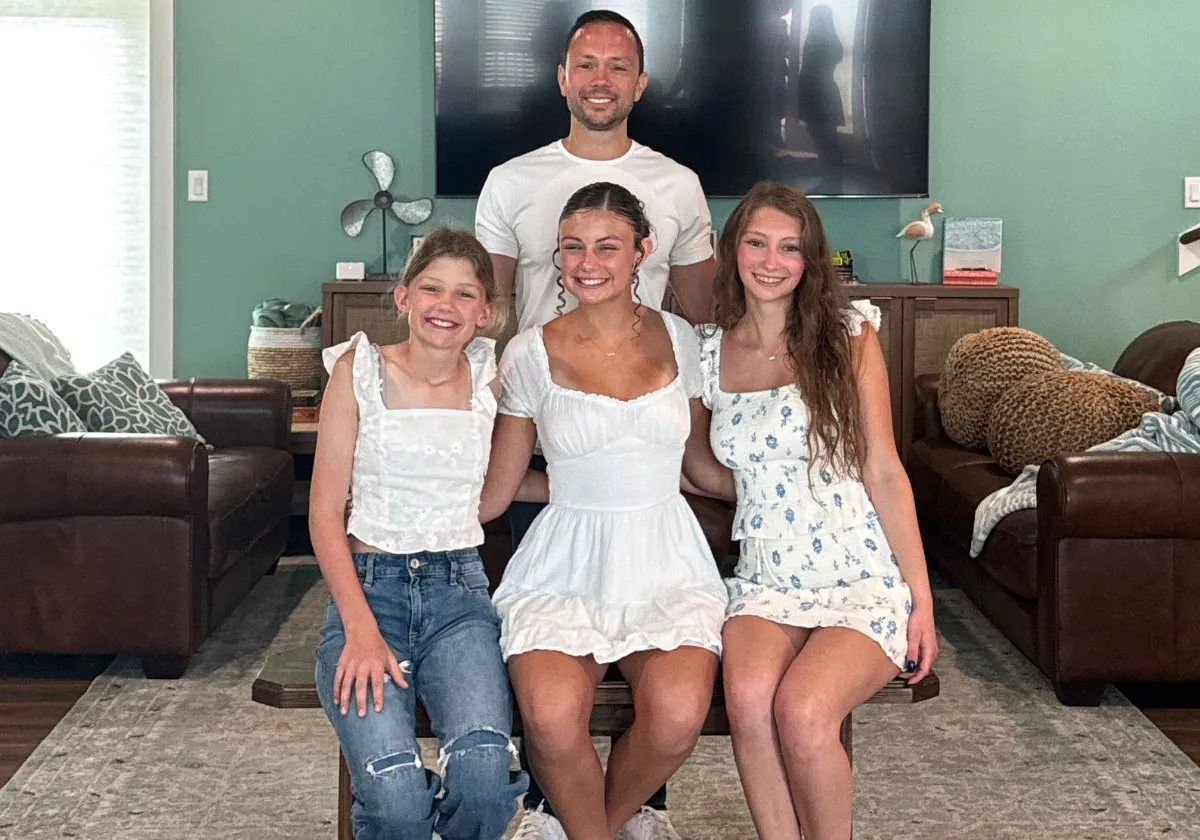 Switch Media Marketing founder with family